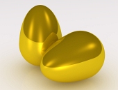 Dve zlaté zlaté vajcia na bielom pozadí